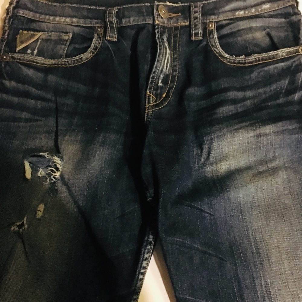 Silver men’s jeans distressed look